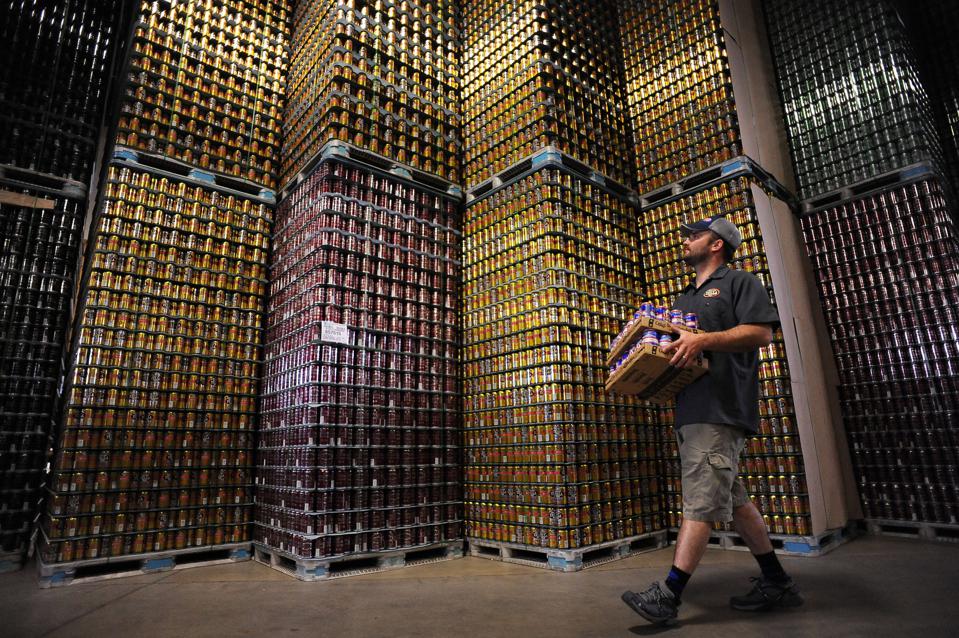 https___specials-images.forbesimg.com_imageserve_61991add1d2dffa9e51ac4ac_Brian-Spotts--shipping-and-receiving-manager--moves-packaged-beer-past-towers-of_960x0